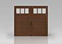 A brown garage door with four windows on a white surface.