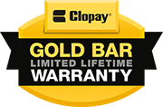 A gold bar limited lifetime warranty badge with a black ribbon.