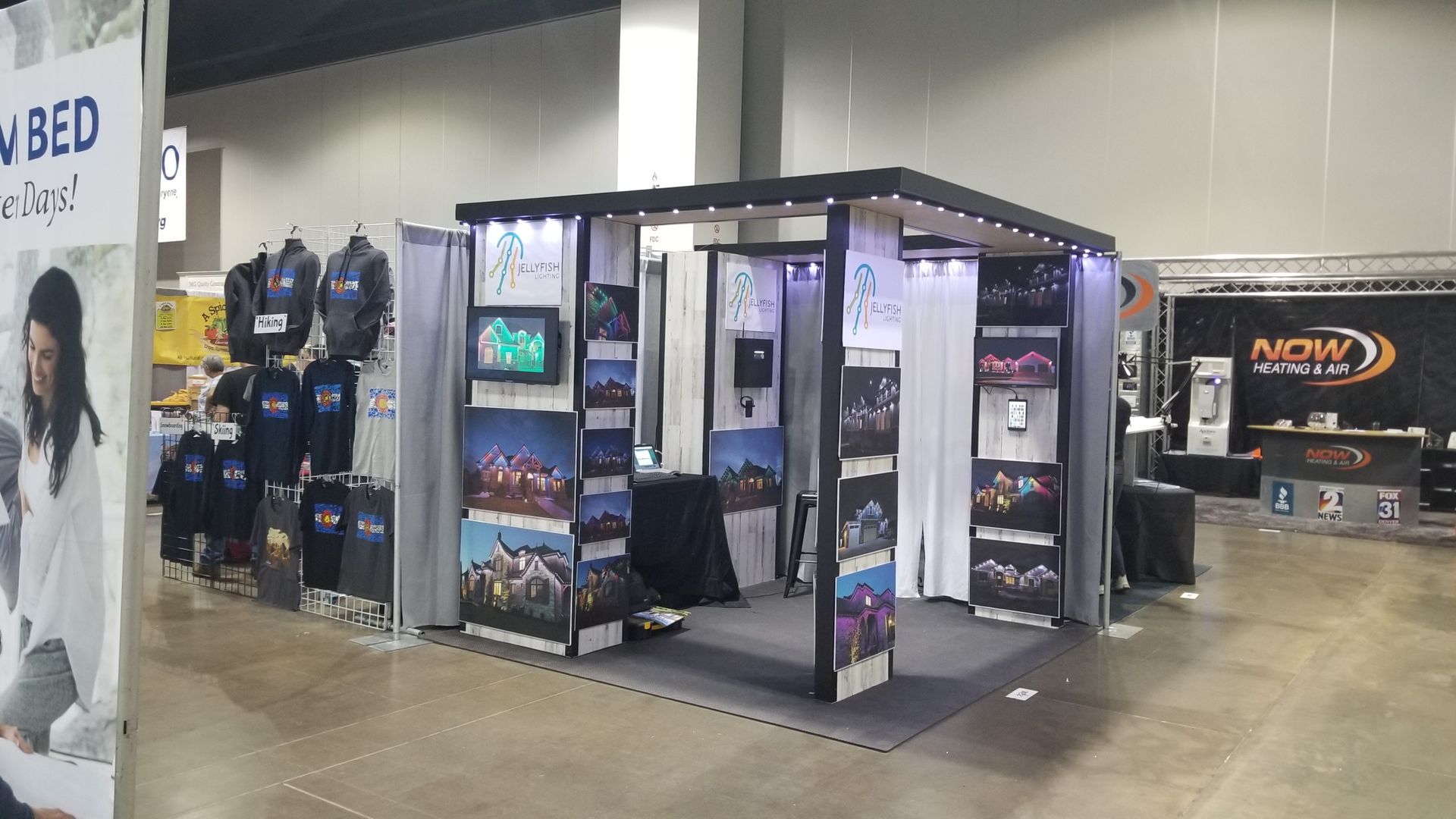 A booth with a sign that says 'new bed' on it