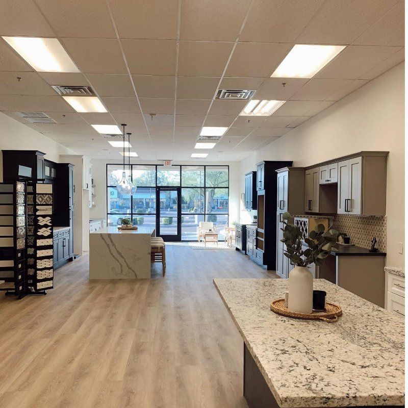 A kitchen with a large island in the middle of the room.