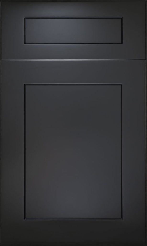 A close up of a black cabinet door on a black background.