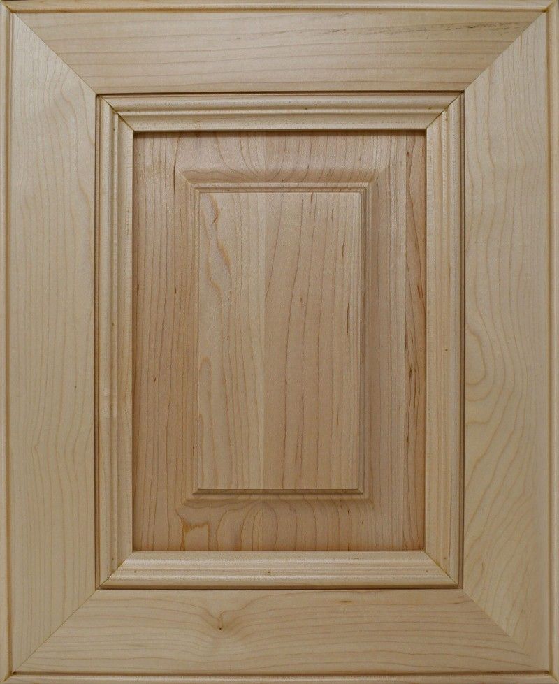 A close up of a wooden cabinet door