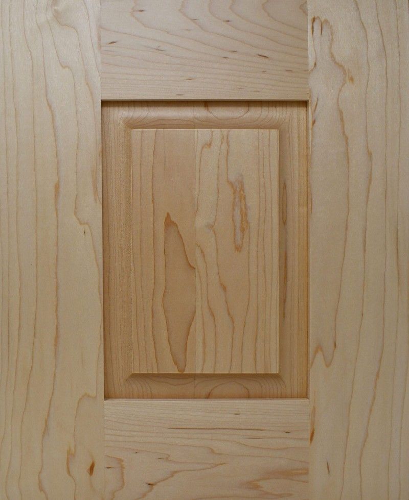 A close up of a piece of wood with a square in the middle.