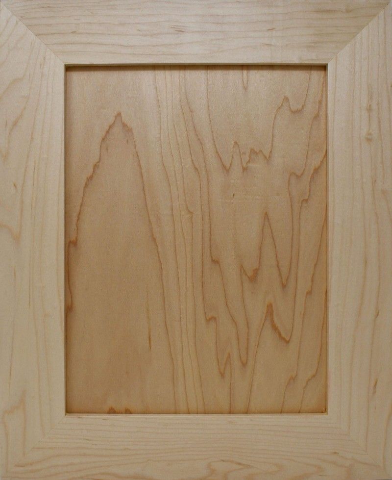 A close up of a wooden picture frame on a table.
