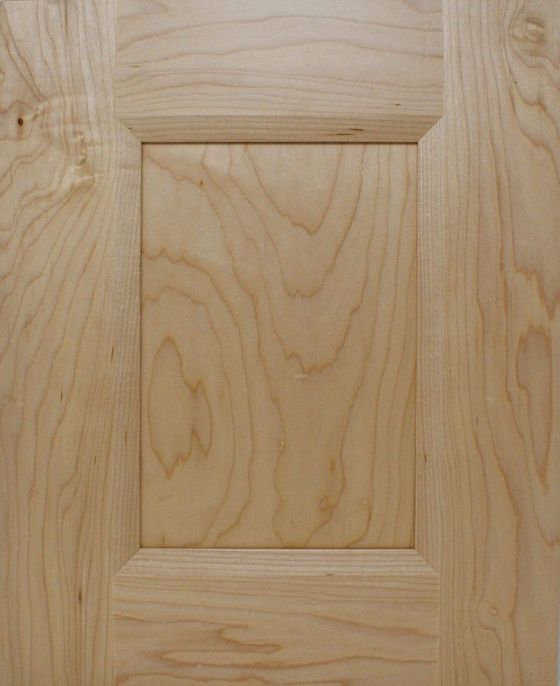 A close up of a piece of wood with a square hole in the middle.
