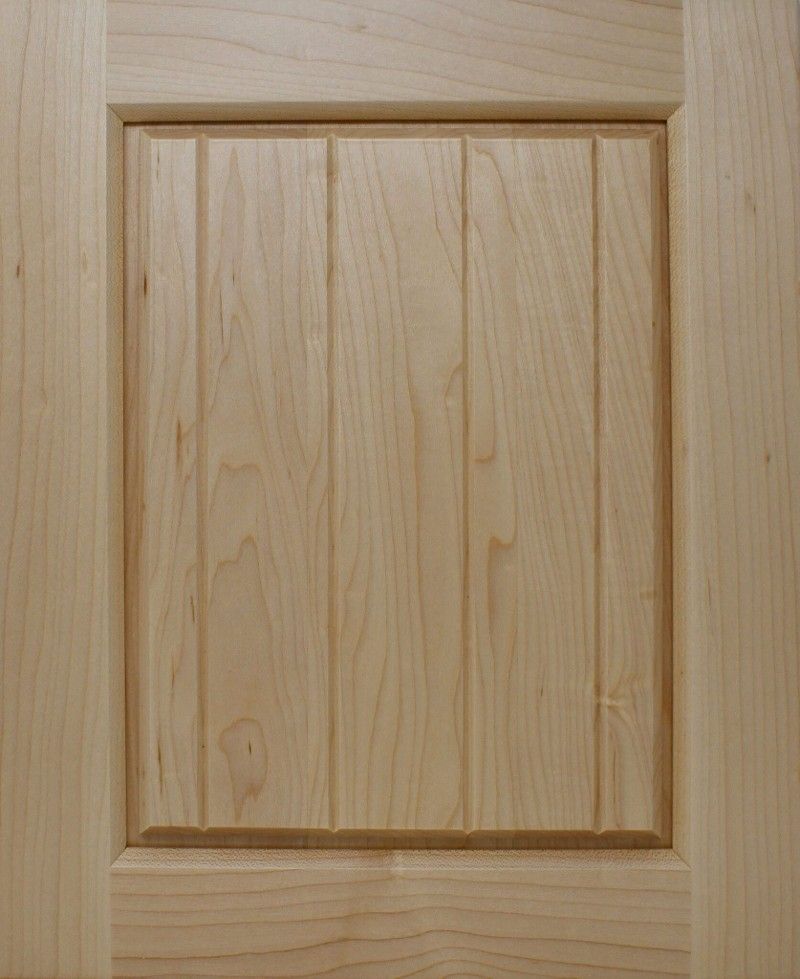 A close up of a wooden cabinet door