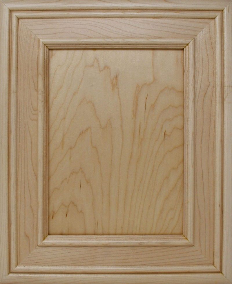 A close up of a wooden cabinet door