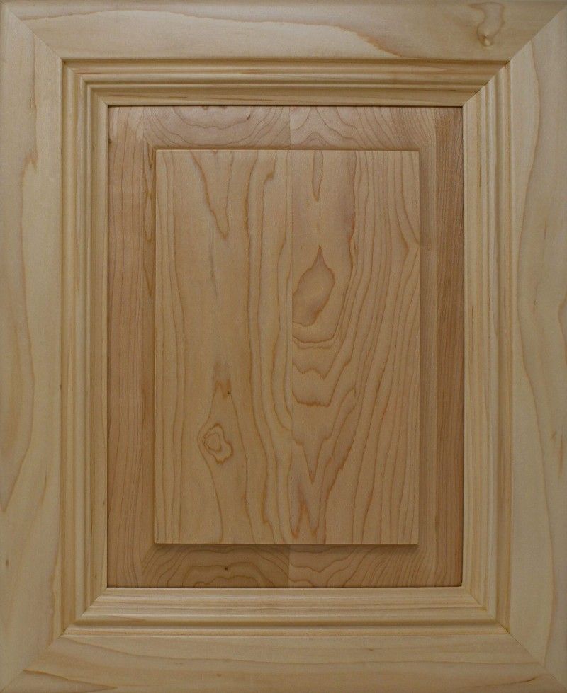 A close up of a piece of wood with a square in the middle.