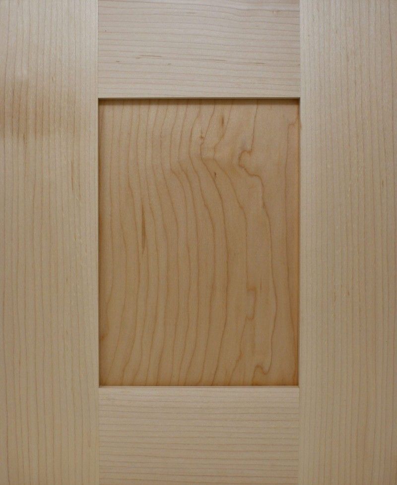 A close up of a piece of wood with a square hole in the middle.