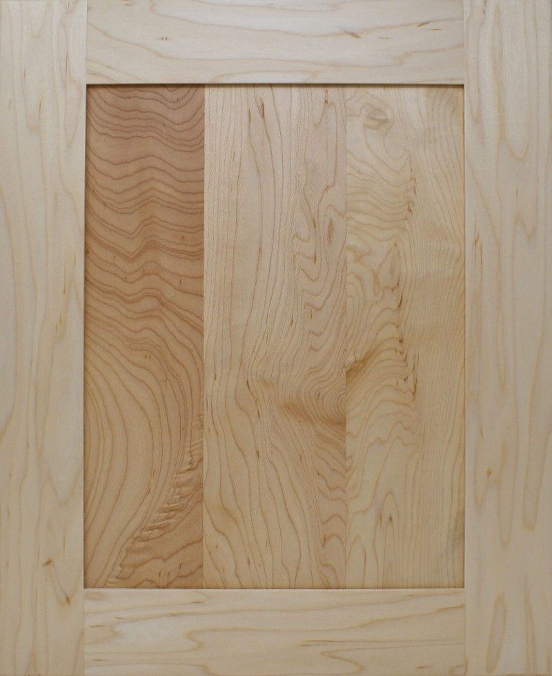 A close up of a piece of wood that looks like a cutting board.
