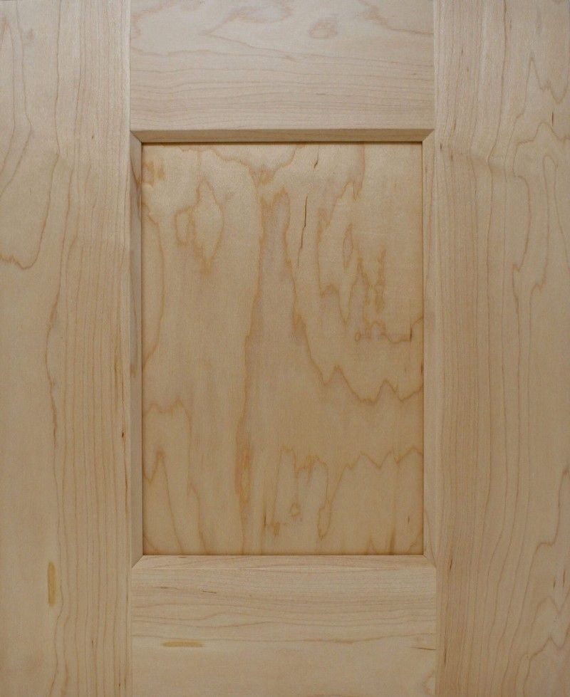 A close up of a piece of wood with a square hole in the middle.
