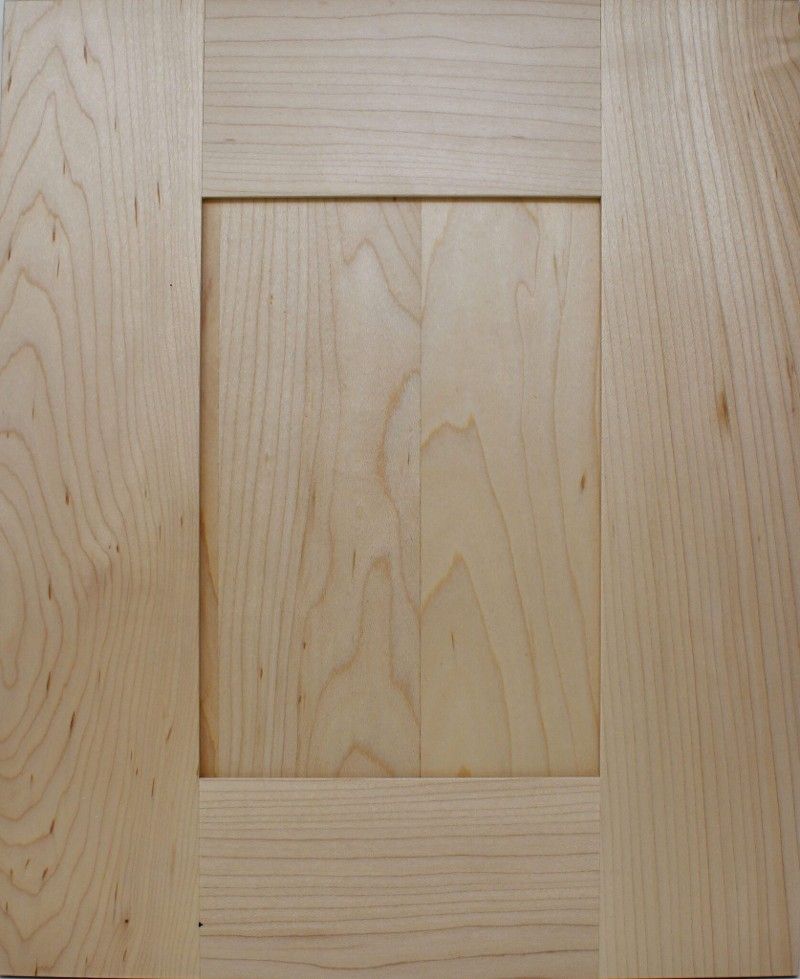 A piece of wood with a square hole in the middle