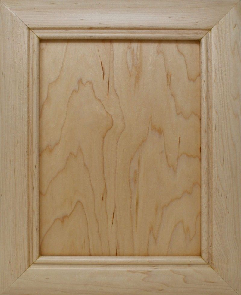 A square piece of wood with a frame around it