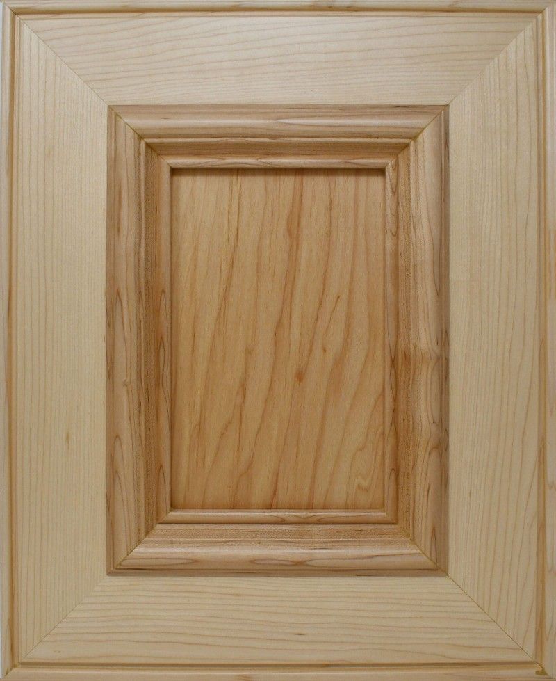 A close up of a wooden cabinet door