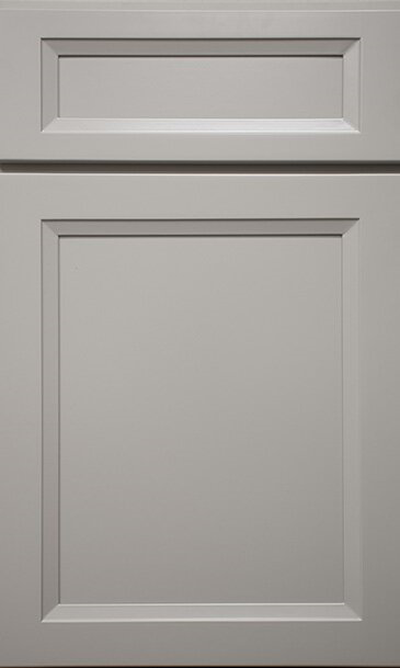 A close up of a white cabinet door on a white background.