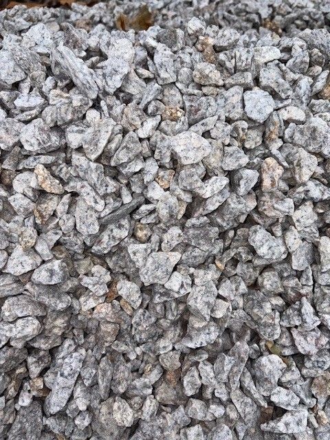 Gray and white crushed stone gravel.