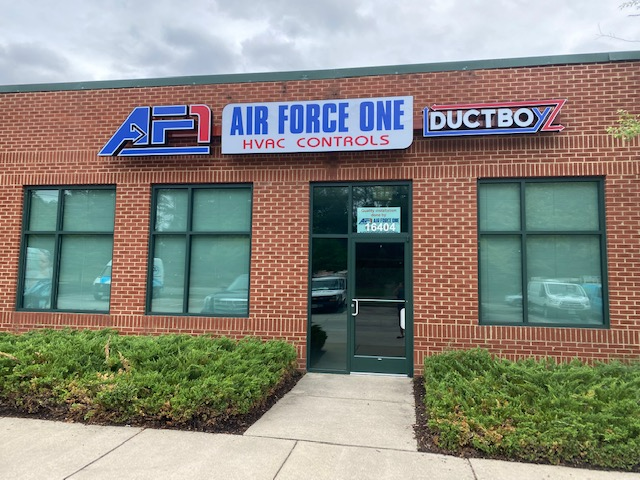 a brick building with a sign that says air force one