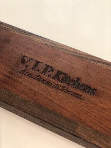 Wooden plaque engraved 'V.I.P. Readers' in dark lettering on a light background