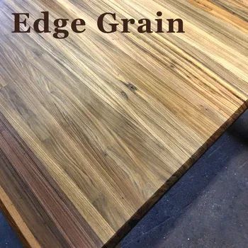 Close-up of wooden planks with a light brown, linear wood grain pattern labeled 