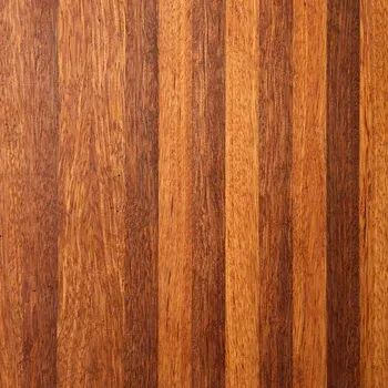 A pattern of vertical wood slats alternating between light tan and dark reddish-brown tones with a visible wood grain.