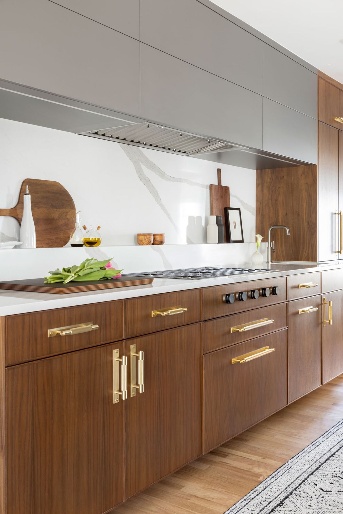 A kitchen with wooden cabinets and stainless steel appliances.