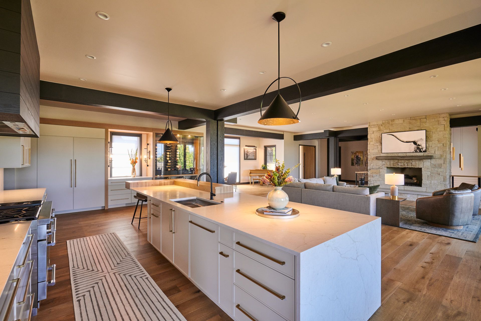 A kitchen with a large island in the middle of the room.