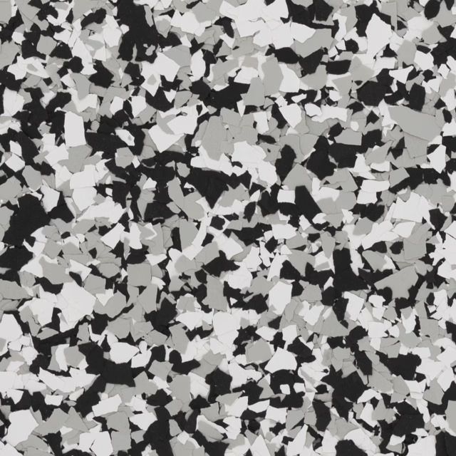 Black, gray, and white camouflage-style abstract pattern with scattered irregular shapes