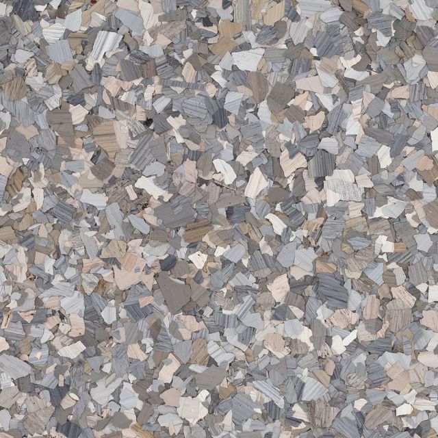 Close-up of a speckled gray, beige, and white terrazzo or stone surface