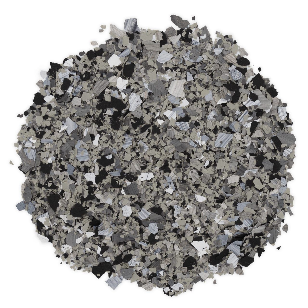 Pile of mixed gray and black granular material on a white background