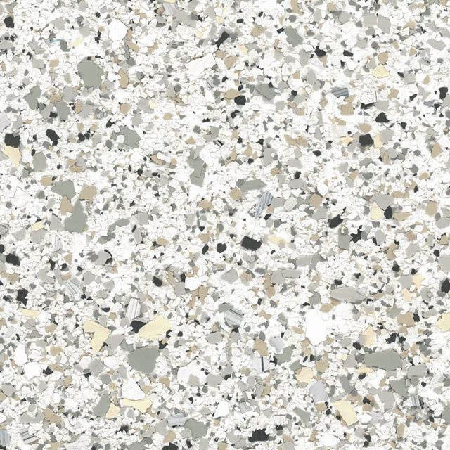 Close-up of a light gray speckled terrazzo surface with white, gray, and black chips