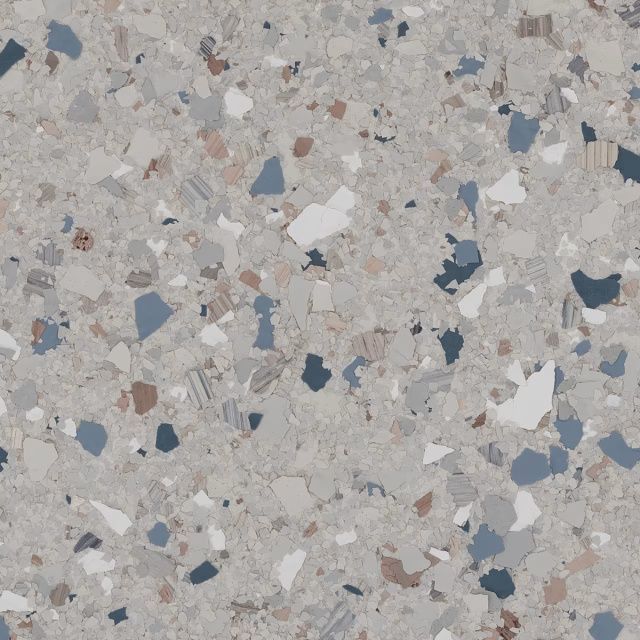 Mottled terrazzo surface in gray, white, blue, and beige speckles