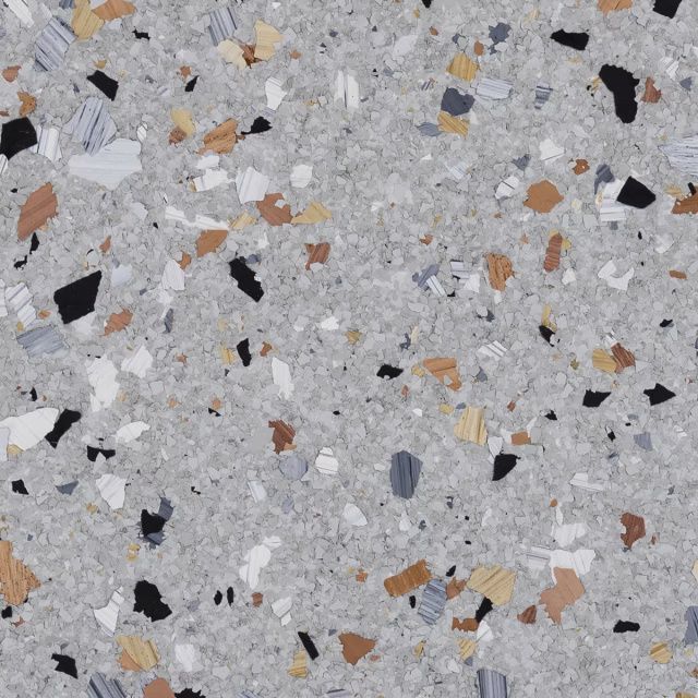 Light gray terrazzo floor with scattered black, white, tan, and orange stone chips