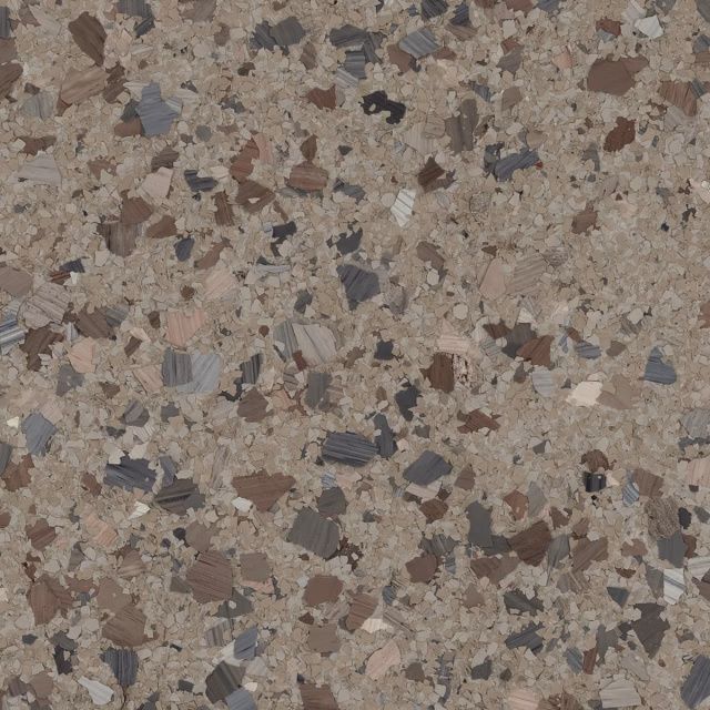 Close-up of speckled beige and brown granite surface with small gray and black flecks