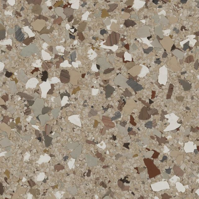 Speckled beige terrazzo surface with white, brown, and gray stone chips