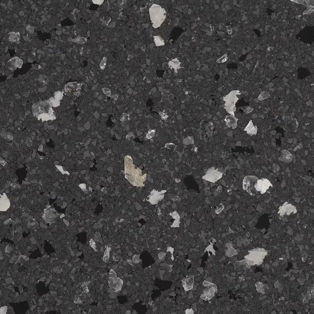 Close-up of dark speckled gray terrazzo or granite surface with white and light gray flecks