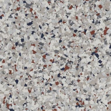 Close-up of a speckled gray, white, and red terrazzo surface