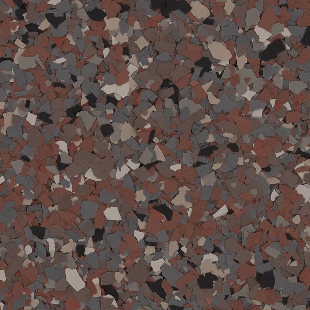 Abstract mosaic of small irregular stones in gray, brown, black, and reddish tones