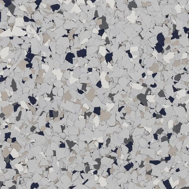 Speckled gray terrazzo surface with white, black, and navy stone chips