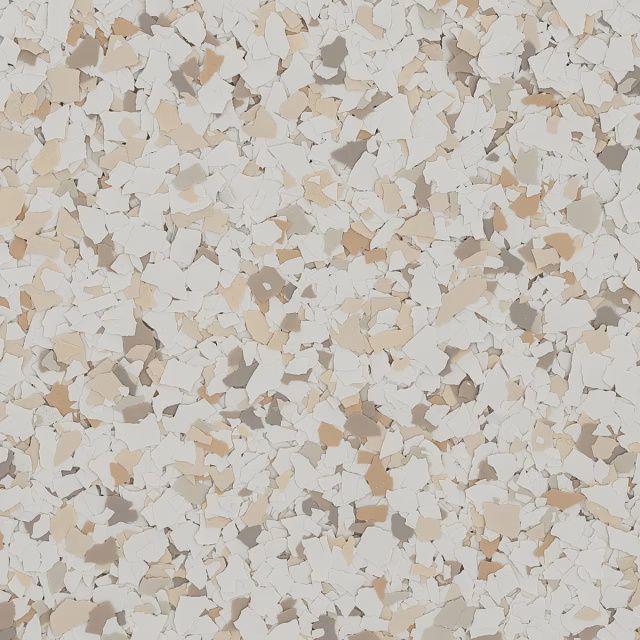 Abstract beige, white, and tan speckled terrazzo-like surface texture
