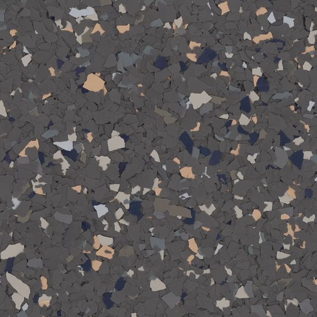 Dark gray speckled terrazzo-like surface with scattered tan and white chips