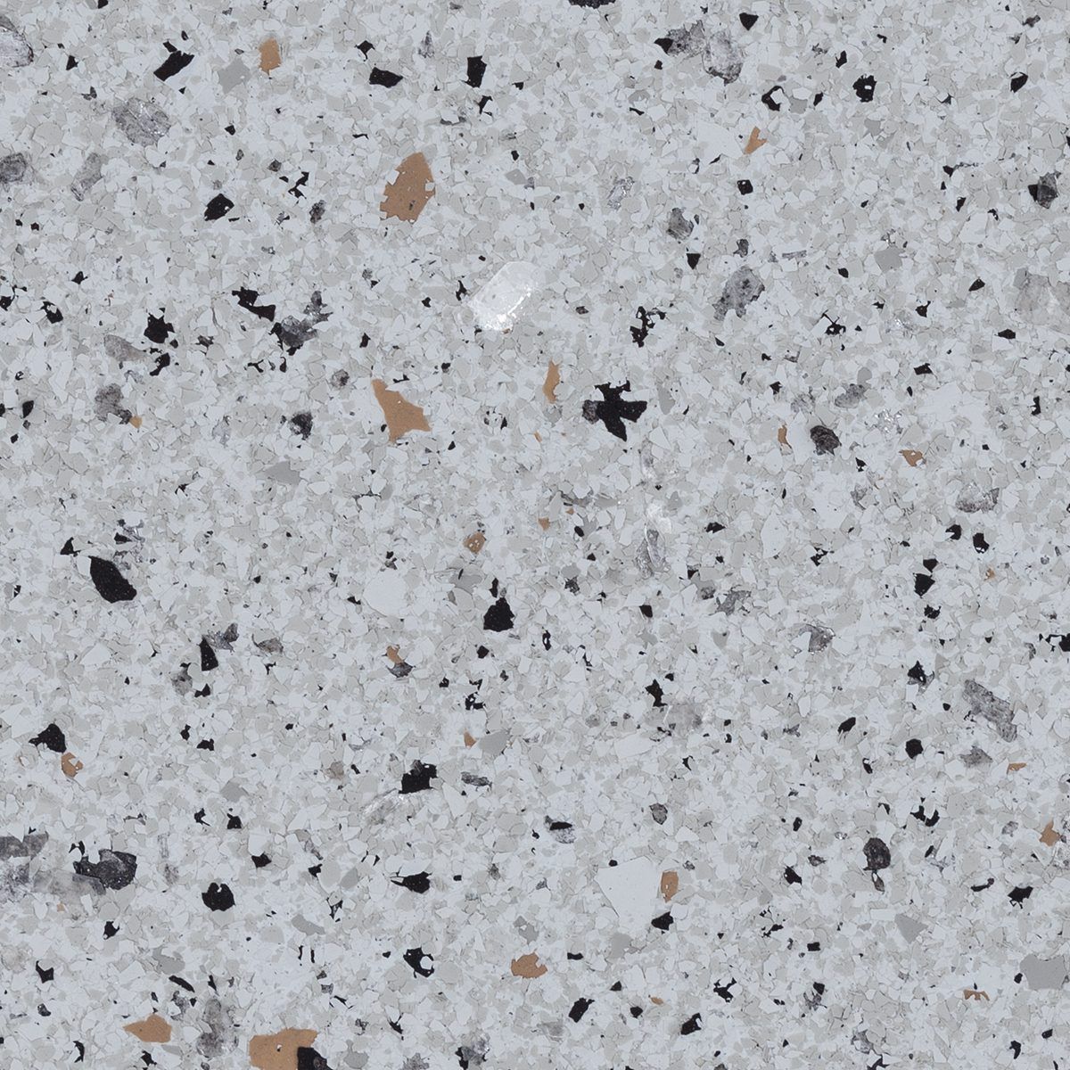 Close-up of light gray speckled stone surface with black and tan flecks