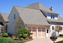 Large house with a shingle roof
