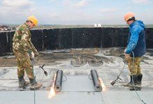 Contractors installation of flat roof