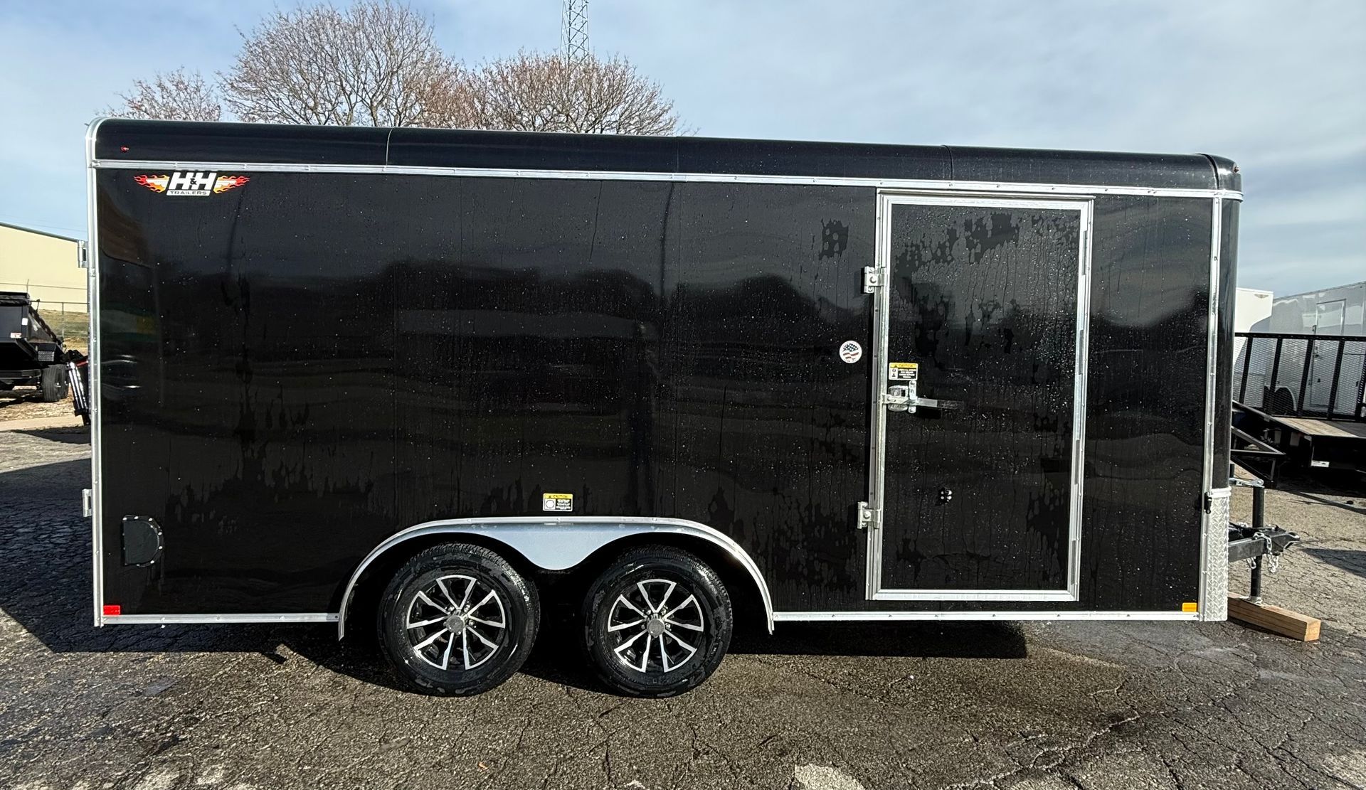 Black enclosed cargo trailer with two axles