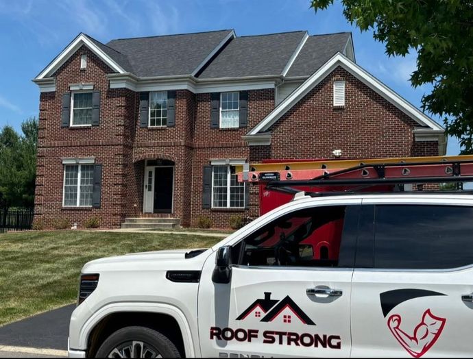 Brick house with a new roof, a white 