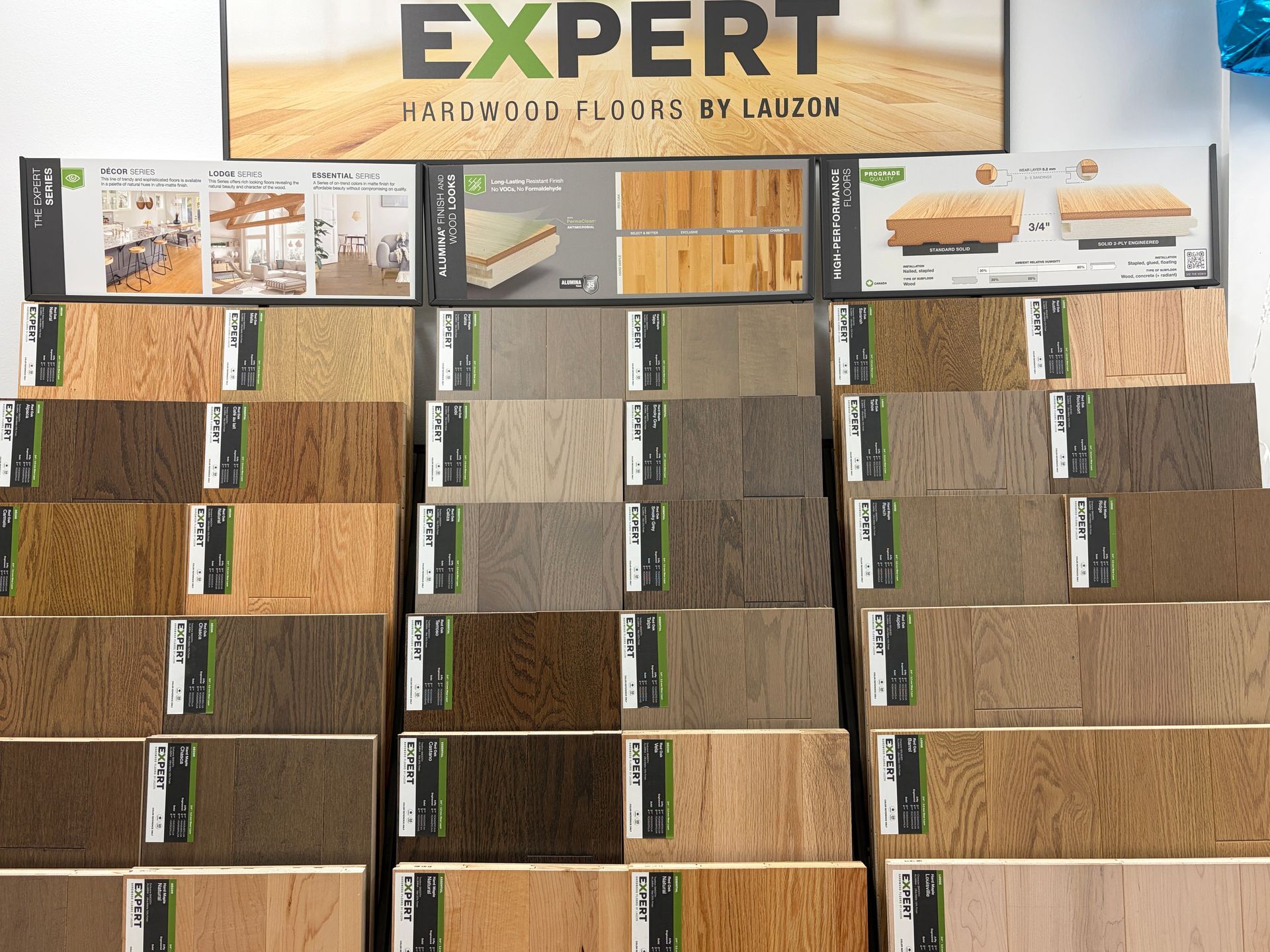 Display of hardwood flooring samples in various shades.