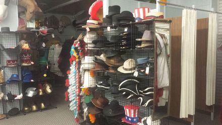 A store filled with lots of hats and scarves