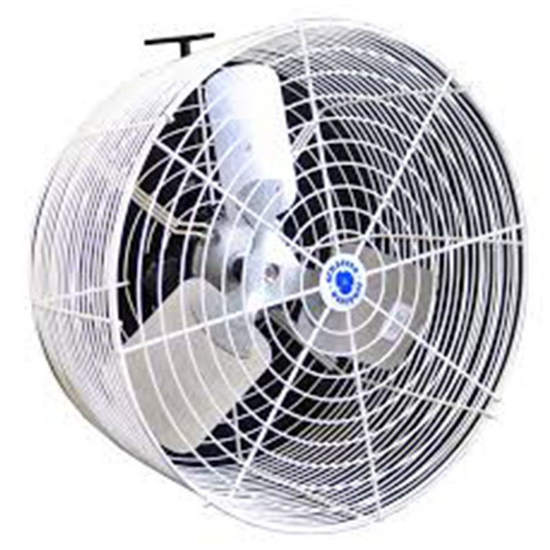 A white fan with a spider web on it is sitting on a white surface.