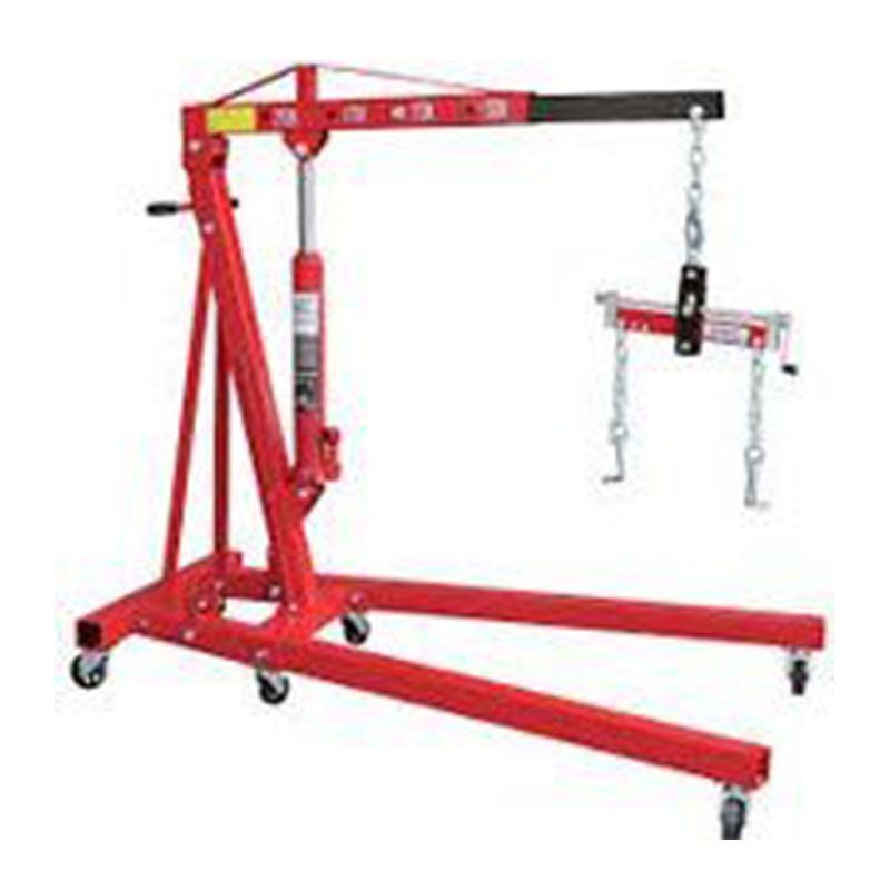 A red engine crane with wheels on a white background.