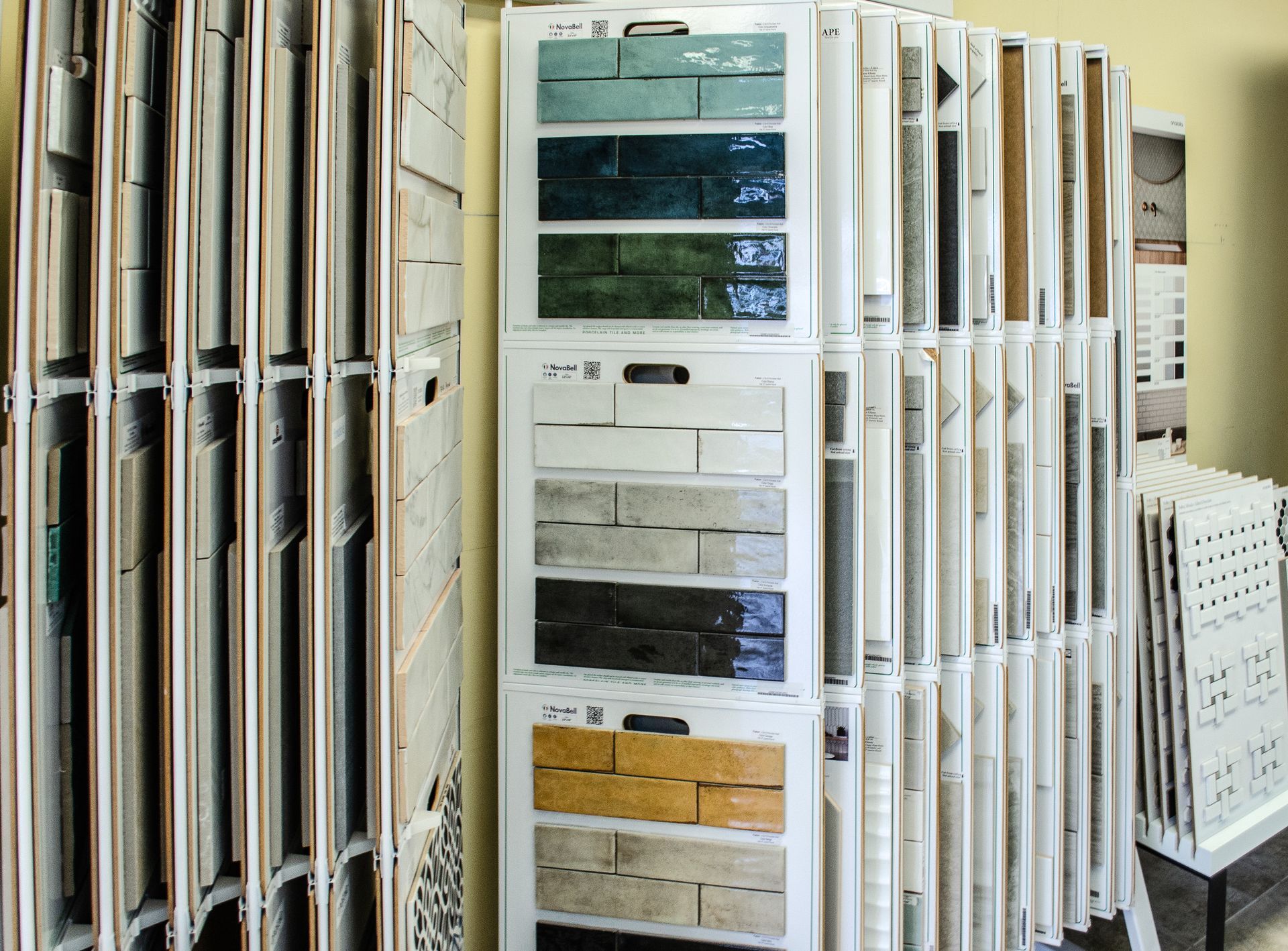 there are many different types of tiles on display in this store